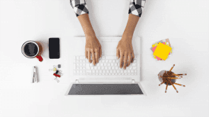 Modern-desk-check-sleeves-recruiter-typing