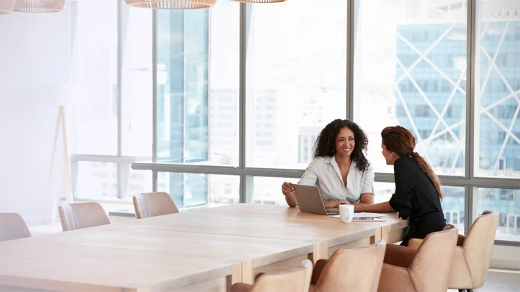 2-women-at-end-of-desk-1200x675-1