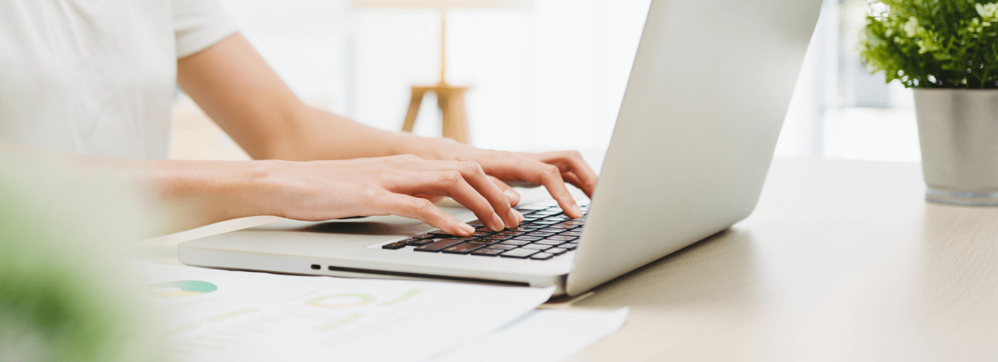 Young Businesswoman Using Laptop in a Recruitment Agency