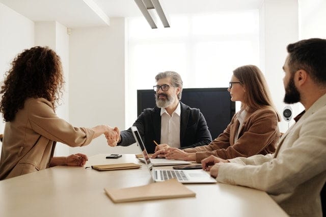 specialists-meeting-together-shaking-hands