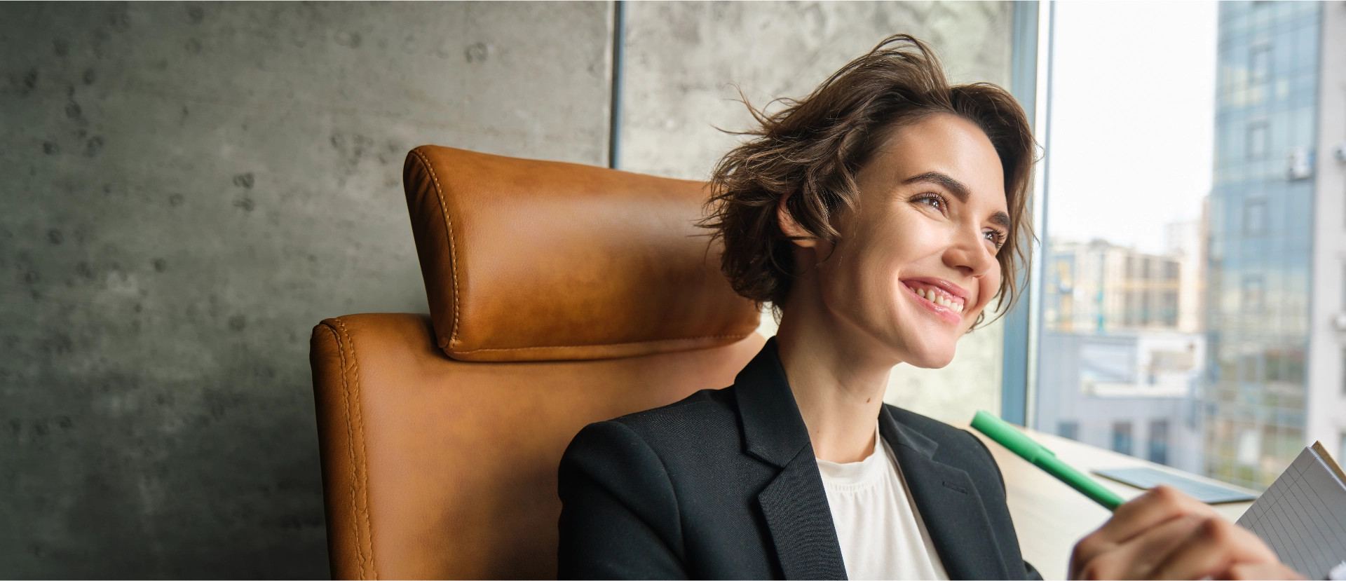 portrait woman working her office businesswoman sitting with her notebook writing making | MJD Recruitment